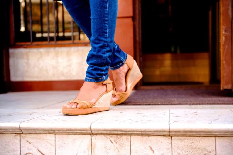 girl wearing jeans and beige wedges